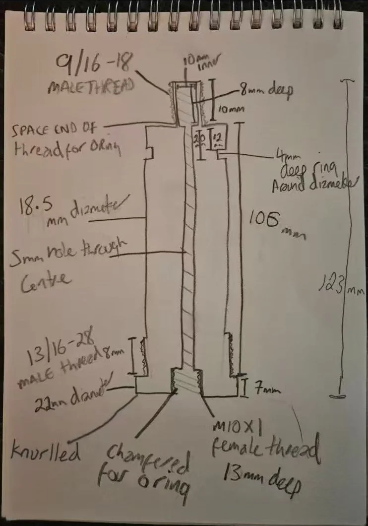 Customer hand sketch of a knurled stainless steel stud with 9/16-18 male thread, 13/16-28 male thread and M10x1 female thread on one body
