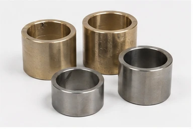 Bronze and hardened steel bushings and plain bearings machined by EKINSUN — the bearing type that can honestly be remade one-off