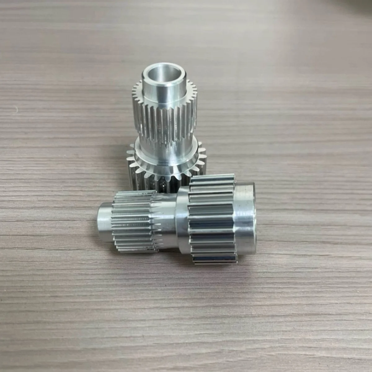 CNC-turned aluminum parts batch — EKINSUN custom connectors