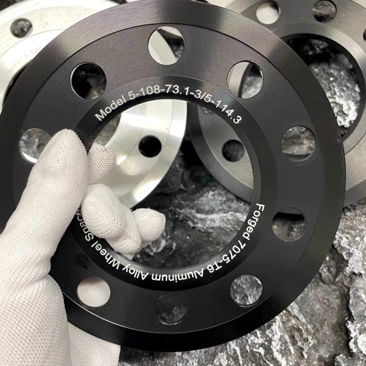 CNC Wheel Spacer Black Anodized Marked — EKINSUN custom manufacturing case photo