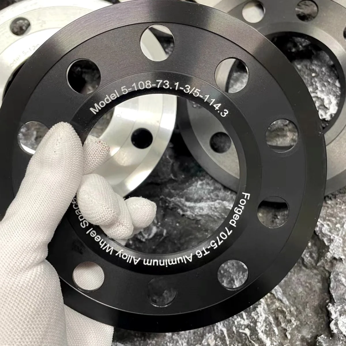 CNC Wheel Spacer Black Anodized Marked — EKINSUN custom manufacturing case photo