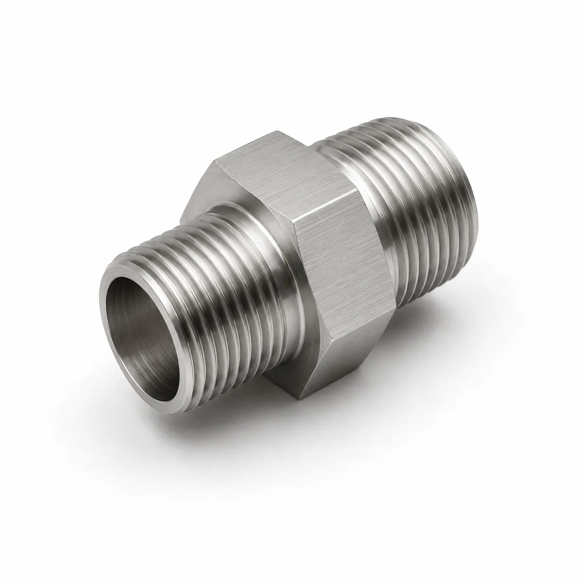 Custom reducing hex nipple adapter machined in stainless steel with a different thread size and pitch on each end