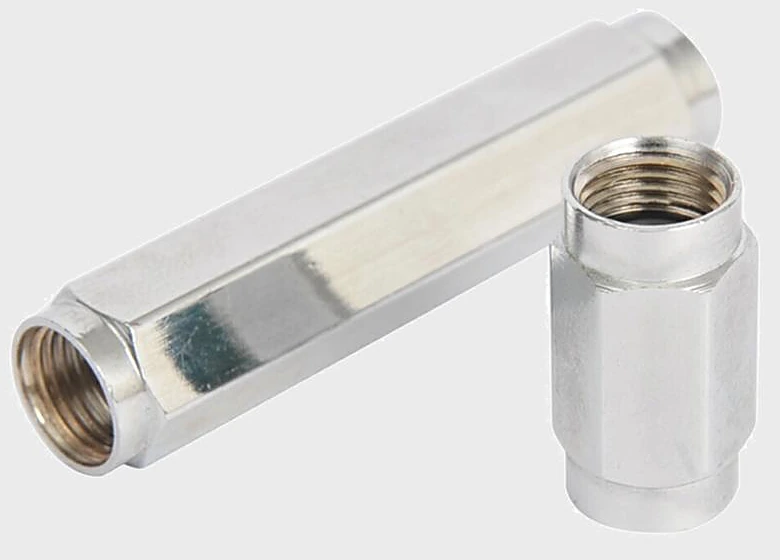 Two plated hex couplers with a female thread at each end, one long and one short, for extending a gas-cylinder connection