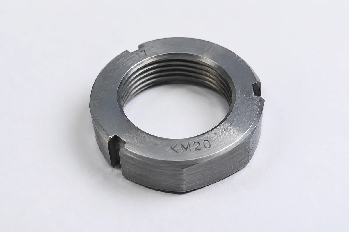 KM20 bearing lock nut machined in steel with face slots and KM20 size marking by EKINSUN
