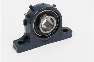 Plummer block bearing housing with insert bearing — the cast housing type EKINSUN remakes from billet steel when the original is broken or obsolete