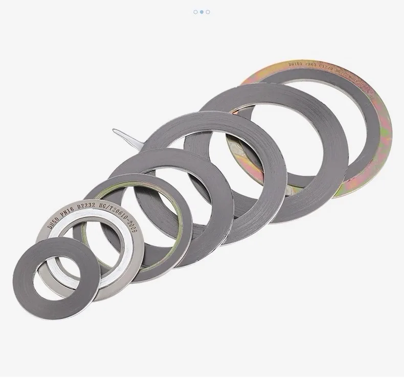 Seven spiral wound gaskets of increasing size with graphite-filled stainless windings, inner rings and painted outer centering rings, marked DN 50 PN 16