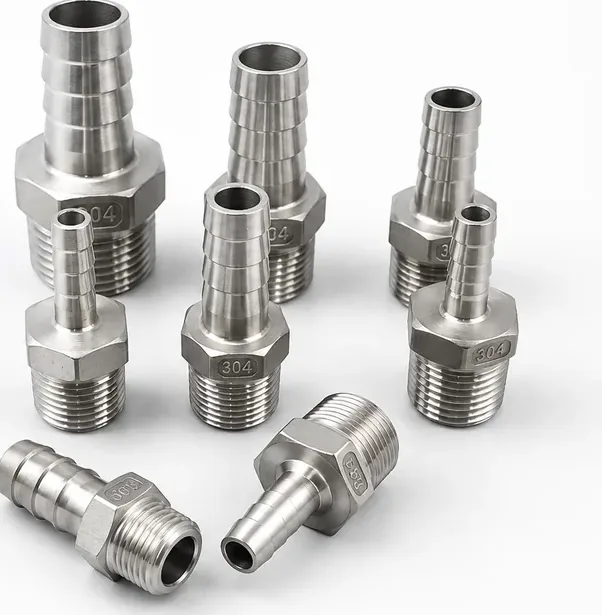 Eight stainless steel hex hose barb adapters of different sizes on a white background, 304 stamped on the hex flats