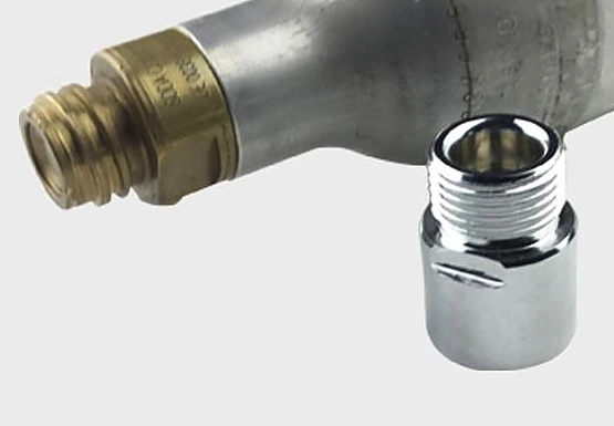 Chrome-plated straight adapter beside the brass TR21-4 valve of a carbonator cylinder: female end onto the valve, male end for the regulator