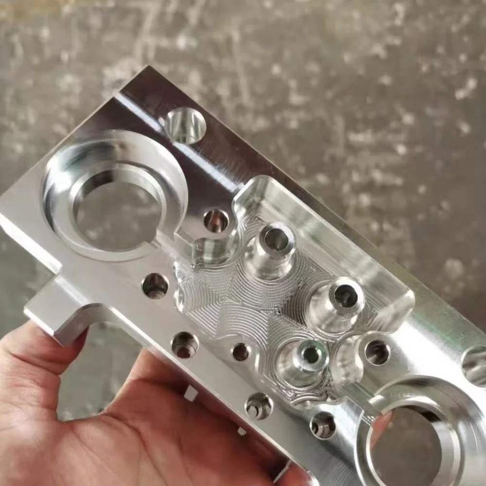 Aluminium valve body machined from solid billet — a cast-style part reproduced by EKINSUN without drawings