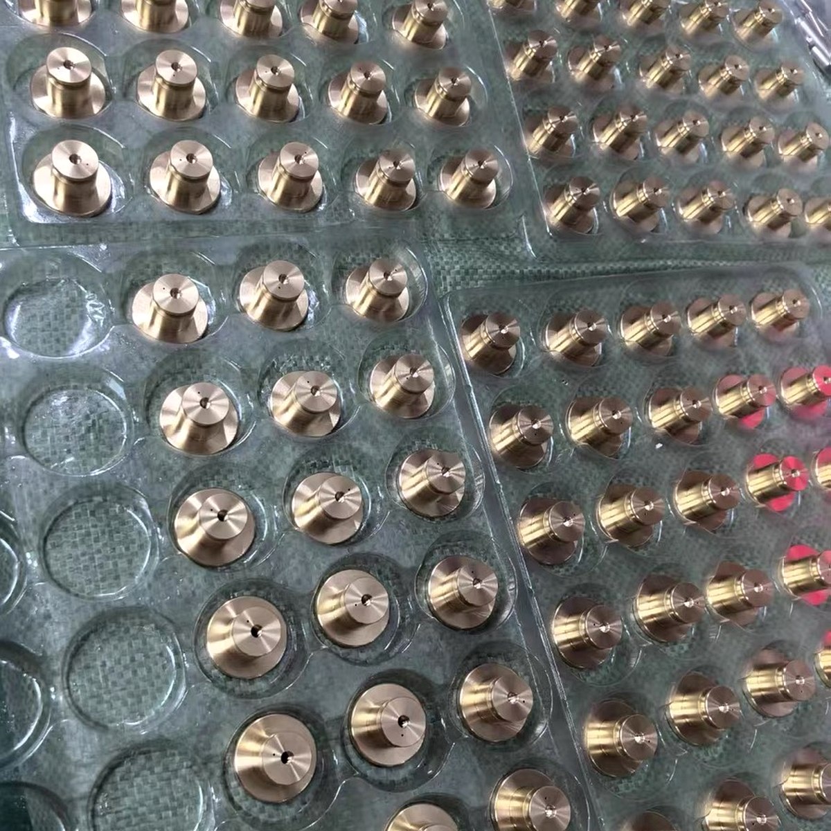 Precision brass CNC parts packed in foam insert tray for international export — EKINSUN Guangdong