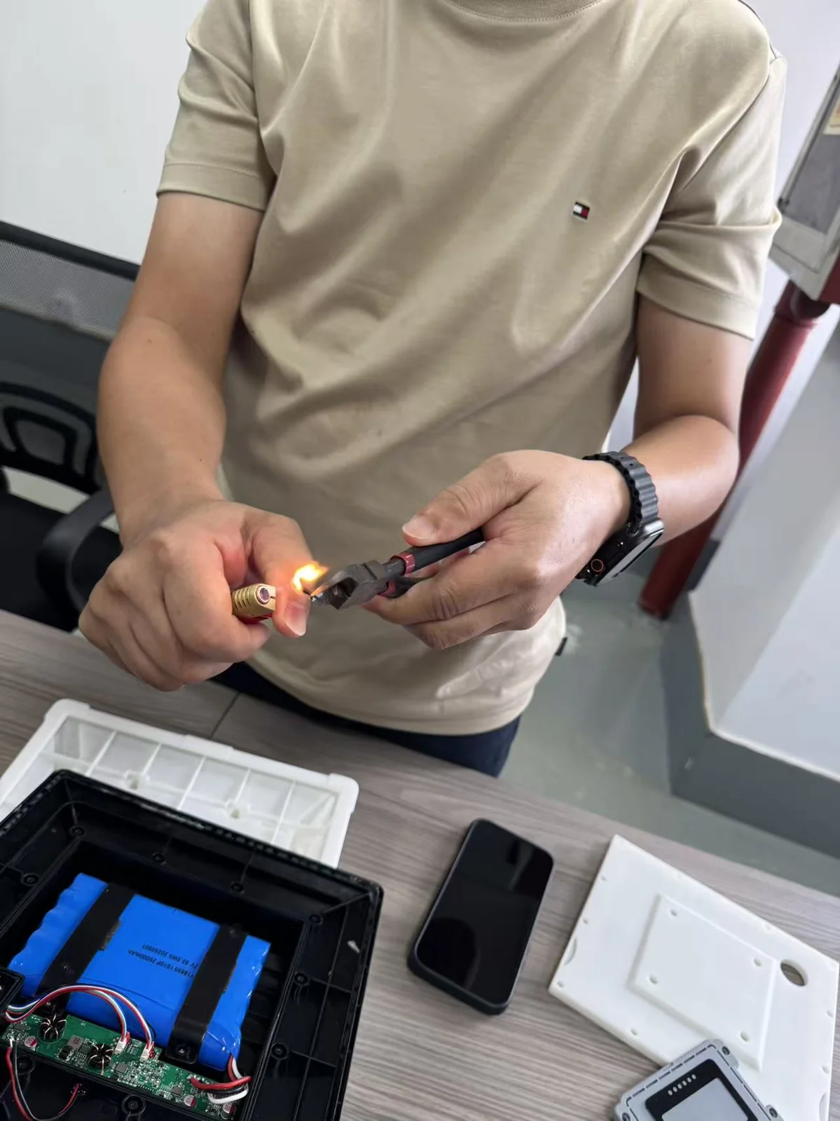 Flame-resistance test on solar BMS enclosure wiring — EKINSUN in-house material safety validation