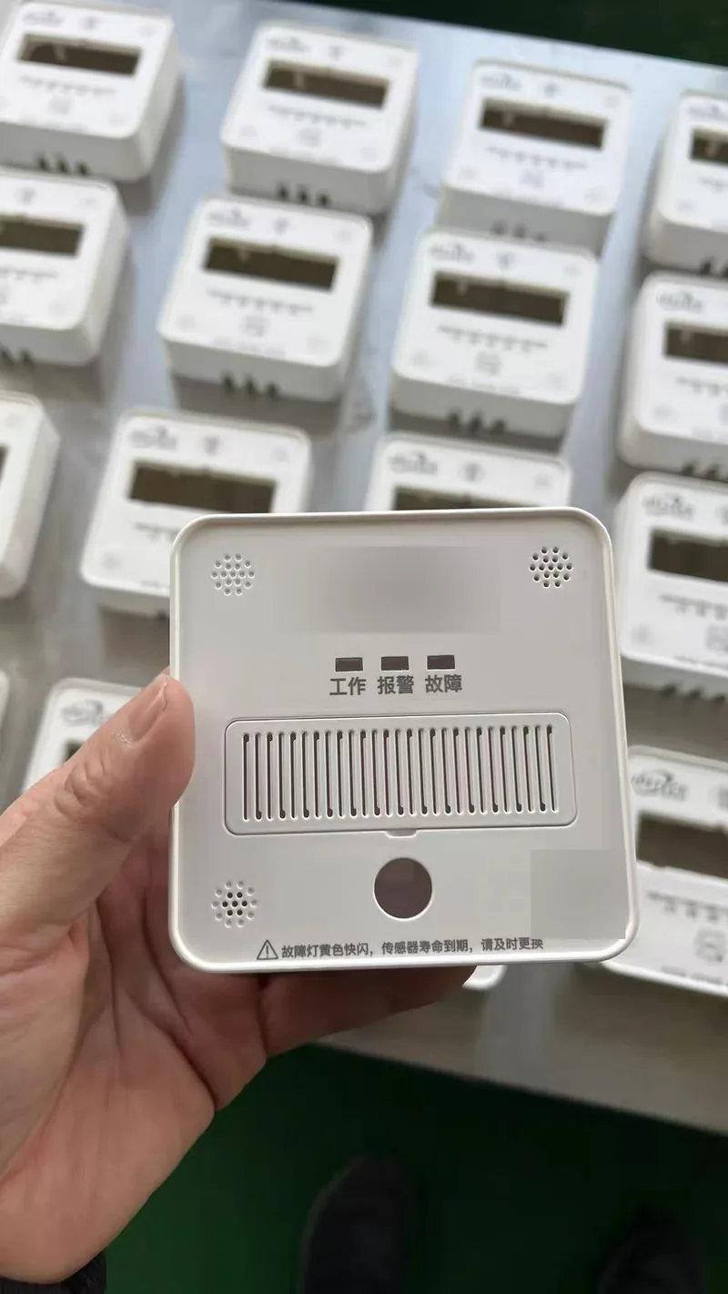 Cast plastic front cover with fine louver slats, showing crisp detail reproduction on a printable panel face
